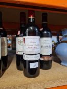 A bottle of Chateau La Croix Taillefer 'Pomerol' 2005, a bottle of Chateau de Mons 2007 Bordeaux and