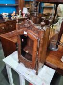 An old French miniature cupboard, carved Walnut with glazed door, 64cm
