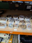 14 Prattware pot lids and bases to include 2 oblong shaped examples