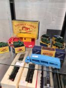 A quantity of Moko Lesney die cast vehicles including Military examples and a Matchbox garage, all b