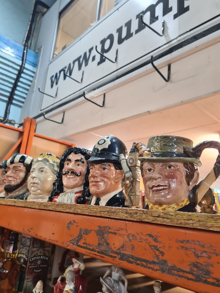 Eleven various Royal Doulton character jugs and a Beswick Character teapot (no lid)