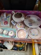 A small tray of Poole Pottery items