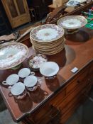 An antique Worcester desert set having 11 plates and 2 comports, and a small quantity of Derby teawa