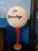 A large scale model golf ball, approx 90cm tall and 40cm diameter