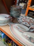 An unusual fish service with platter, 2 sauce boats and 10 plates by Digoin and Sarreguemines and on
