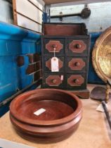 A small wooden chest having six drawers and a turned mahogany fruit bowl