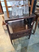 An antique oak two tier table having one drawer, 54.5cm