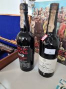 A bottle of Quinta Do Noval Port 1962 and a bottle of Taylor's vintage Port 1977