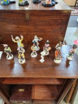 A set of Meissen style Monkey musicians (one with stand)