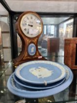 A Comitti Edwardian style mantle clock with Wedgwood Jasperware plaque and 3 Wedgwood plates