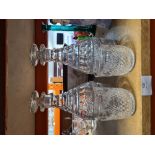 A pair of antique cut glass decanters and a pair of later tumblers engraved flowers