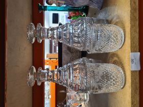 A pair of antique cut glass decanters and a pair of later tumblers engraved flowers