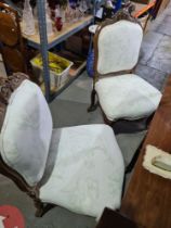 A pair of French Walnut salon chairs, circa 1900