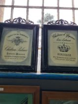 A pair of painted metal picture frames