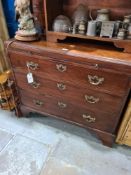 A Georgian mahogany chest having 4 long drawers with brushing slide (later top)