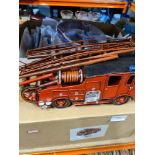 A selection of collector's plates depicting trains, barges, etc and a modern metal model of a Fire E