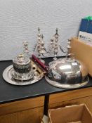A pair of silver plated candelabra, a meat cover and sundry