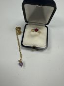 9ct yellow gold dress ring set with round cut ruby, marked 14K, size N, a 14K gold ropetwist necklac