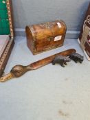 An antique Walnut dome top letterbox having brass decoration, a duck head paperknife and two Bavaria