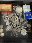 Tray of mixed items to incl. heavy silver bracelet hung with seven medallions, white metal crucifix,