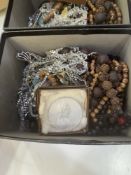 Box containing mostly bead necklaces