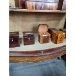 A selection of various tea caddies some with inlaid design