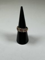 9ct yellow gold ruby and diamond diamond ring of twisted alternating form, marked 375, size N, 4.4g