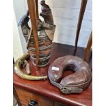 A Middle Eastern style brass powder horn, water bottle and leather collar