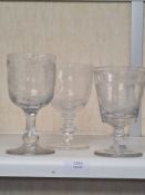 Three 19th Century engraved goblets, one decorated ship and bridge