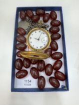 Cherry amber style beads, gold plated half hunter pocket watch on silver albert chain hung with meda