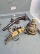 A circa 1800 percussion pistol engrave I Barber, with ornate handle, a miniature model Pickelhaub he