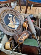 A box of treen items, including carved cups, boxes, reproduction musket and a large wooden rule