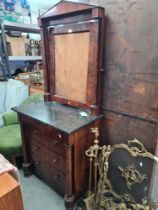 A 19th Century French mahogany Empire dressing chest having four long drawers, column sides and blac