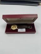 Tudor; A vintage 9ct gold cased gents 'Tudor' watch with golden dial and baton markers on brown leat