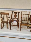 An antique bamboo style apprentice chair and two others