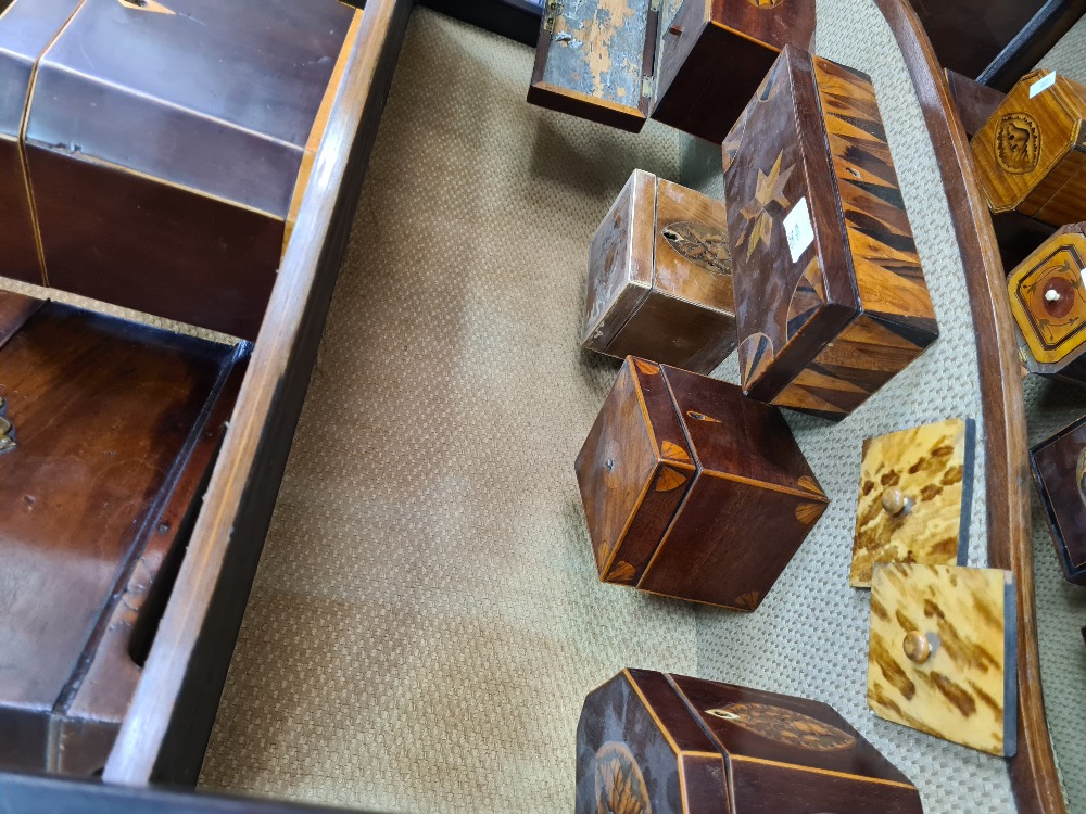 A selection of various tea caddies some with inlaid design