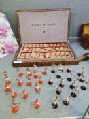 An early 20th century French set of Lead ruby players in original box and game board 30 players