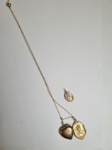 Fine 9ct yellow gold fine neckchain hung with 9ct heart shaped locket, chain unmarked, locket marked
