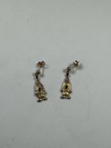 Pair of 9ct gold drop earrings in the form of clowns, 2cm, marked 375, 2.6g