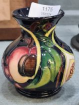 A modern Moorcroft squat vase decorated figs and fruit, 9.5cm