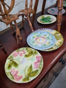 A selection of Majolica style plates of various designs including Strawberry, Asparagus, etc