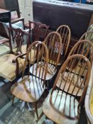 A set of six Ercol stickback dining chairs