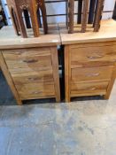 A pair of modern oak 3 drawer bedside chests