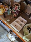 A selection of ceramics including Poole Pottery, Royal Doulton figures, paperweights, etc