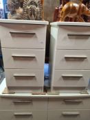 A pair of bedside cabinets and a chest of drawers, white high gloss finish
