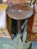 An old mahogany torchere/plantstand