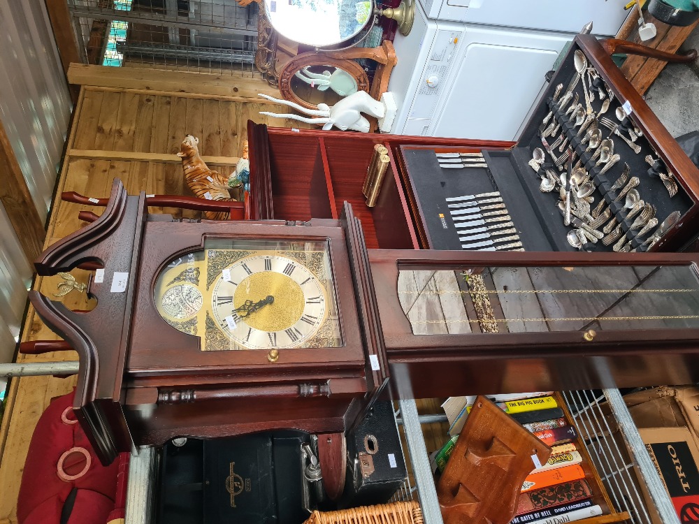 A modern Grandfather clock made in Germany, marked Tempus Fugit