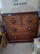 Two short over two long chest of drawers