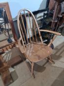 A stickback small rocking chair and a pine mirror