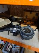 A selection of collectables including cameras, scales, compass, etc